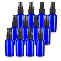 JUVITUS Cobalt Blue 2 oz Boston Round PET Plastic Bottles (BPA Free) with Black Fine Mist Sprayer (12 Pack)