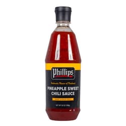 Steve Phillips World Cuisine Pineapple Sweet Chili Sauce in a 25 oz. squeeze bottle used in Phillips Seafood Restaurants worldwide
