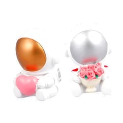 HAKIDZEL 2pcs Resin Astronaut Figurines Mini Spaceman Ornament Set for Room Decoration Desktop Collectible Home Décor Accents