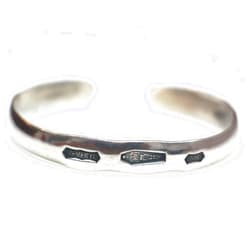 Studio S71 Steel punch imprinted memento mori silver cuff bracelet