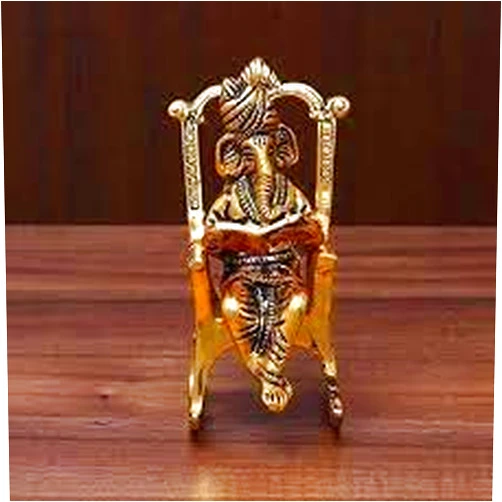 HEENA HOME DECOR Lord Ganesha Statue Sitting on A Chair and Reading Ramayan White Metal