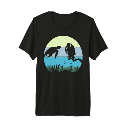 Scuba Diver and Turtle In The Ocean Apparel Co Scuba Diver Diving and Sea Turtle in The Blue Pacific Ocean Premium Tri-Blend T-Shirt