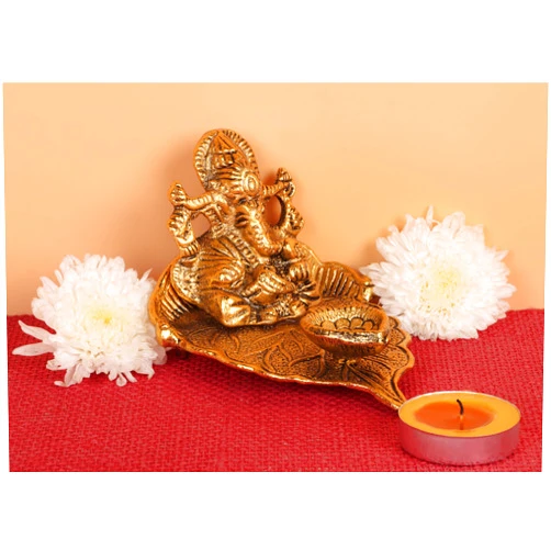 The Bright Storey Idol Golden Small Ganesh on Leaf with Diya for Home Ganpati Figurine Luck & Success Diwali Pooja