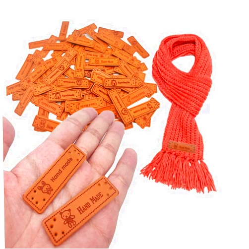 Wangzzniu 100 Pcs Handmade PU Leather Tags with Holes Rectangle Embossed Labels PU Leather Handmade Tags Handmade Knitting Labels for DIY Sweaters Scarves Bags Gloves Hats