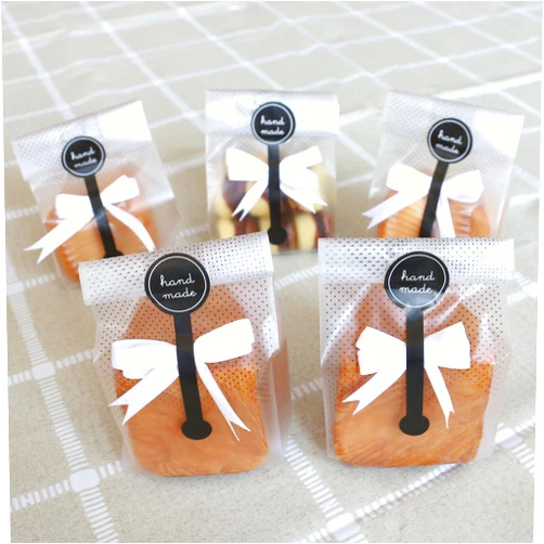 Searik Cookie Bags for Packaging, Searik Translucent Plastic Cellophane Pastry Treat Bags for Party Gift Giving Bakery Bread Candy Chocolate Wrapping Goods with Stickers and Ribbon (3.5 x 8.8 Inches, 80 Pcs)