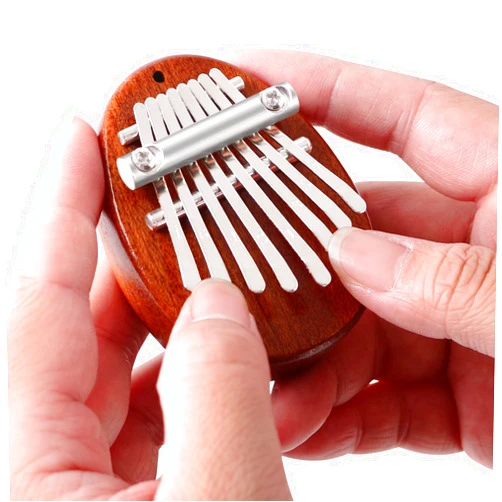EASTROCK 8 Key Mini Kalimba, Finger Thumb Piano with Accessory Pendant Gift, Exquisite Finger Piano Ornaments Christmas Gift for Kid Adult Beginners