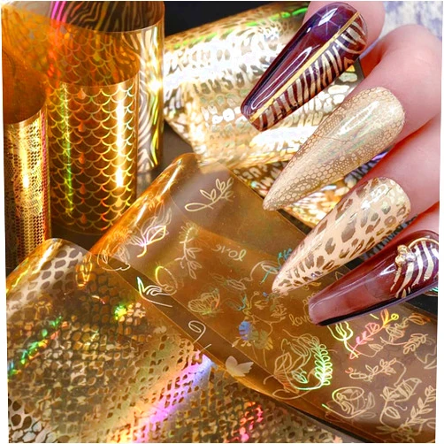 KTAABTR 16 Sheets Gold Nail Foil Transfer Sticker kit Holographic Laser Star Moon Flower Heart Nail Art Foil Transfer Sheets for Nail Designs Gold Luxury Designer Nail Stickers Decoration DIY Manicure Accessories