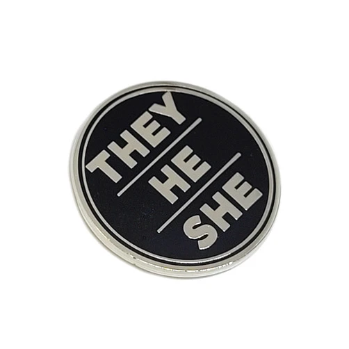 Hokum and Snark They He She Pronoun Pin Silver and Black Circular Hard Enamel Nonbinary Pronoun Button Badge