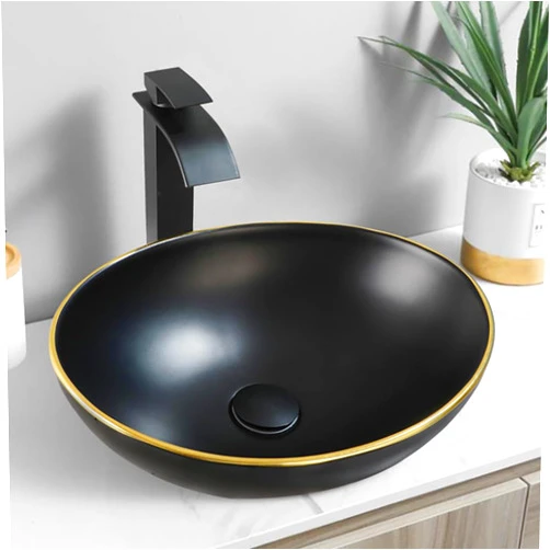 Focitland 16 Inch Bathroom Vessel Sink with Waterfall Faucet and Pop-Up Drain Combo,Black Ceramic Sink Basin Oval Bathroom Sink Above Counter with Gold Rim