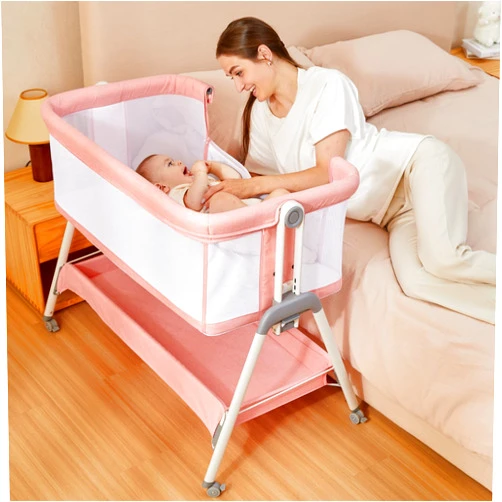 ANGELBLISS Baby Bassinet Bedside Crib with Storage Basket and Wheels, Easy Folding Bed Side Sleeper Adjustable Height Portable Crib for Newborn (Pink)