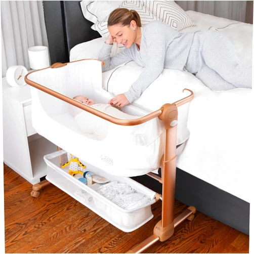 KoolerThings Baby Bassinet, Bedside Sleeper for Baby, Easy Folding Portable Crib with Storage Basket for Newborn, Bedside Bassinet, Comfy Mattress/Travel Bag Included (White and Gold)