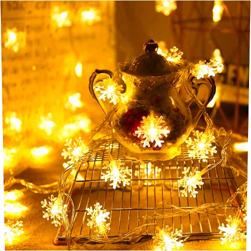 Buradanaldim Christmas Snowflake String Lights Battery Operated for Xmas Garden Patio Bedroom Party Decor Indoor Outdoor Celebration Lighting (10 Ft 20 Led, Warm White)