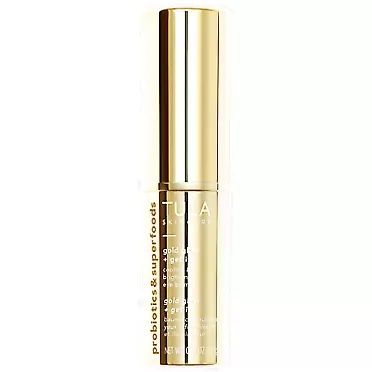 TULA Skin Care Gold Glow & Get It Cooling & Brightening Eye Balm | Dark Circle Under Eye Treatment, Instantly Hydrate and Brighten Under Eye Area, Portable and Perfect to Use On-the-go | 0.35 oz.