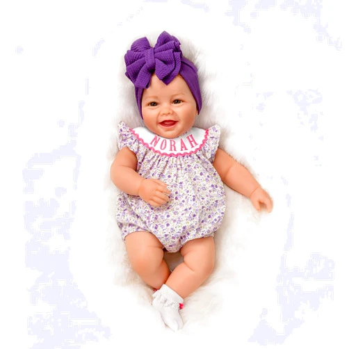 The Ashton-Drake Galleries Lifelike Reborn Norah Baby Doll, 17 inches, Handcrafted RealTouch® Vinyl Collectible by Ping Lau, Purple Bow