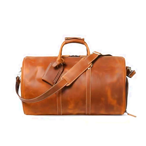 Mullis Mercantile LLC Mullis Mercantile Leather Weekender Travel Bag, a timeless classic. This vintage leather duffle bag is perfect for airline carry on, full-grain leather, a retro design, gym, and a YKK zipper in brown.