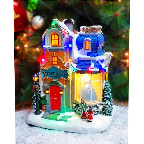 MOMENTS IN TIME 10.6”H Polyresin Christmas Village LED & Musical Vintage Boutique Battery Operated (Not Included)