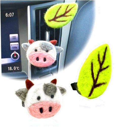 JUYQZ Cute Cow Car Air Vent Clips - Kawaii Farm Animal Head with Green Leaf Dashboard Decor - Soft Wool Felt Auto Interior Charms - Aesthetic Black and White Car Accessories Gift for Cow Lovers