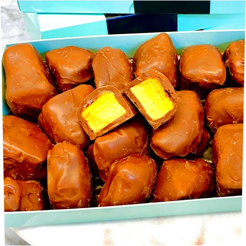 MalibuGift Milk chocolate honeycomb sponge candy. Crunchie chunks of honeycomb candy hand dipped In gourmet milk chocolate