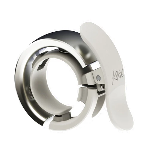Knog Oi Prima Bike Bell – Loud 80dB Ring, Wrap-Around Design, WAVETEK Hammer, Durable Build, Easy Install – Two Sizes to Ensure Correct Fit.
