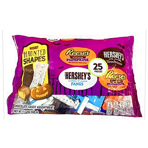 Hersheys Haunted Shapes Chocolates (1) Bag Net Wt 11.3 oz (320g) Assorted Flavors: Hershey's Milk Chocolate Tombstones, Reese's Peanut Butter Pumpkins, Hershey's Cookies 'n' Creme Fangs, Reese's Peanut Butter Cups Miniatures - 25 pieces in a Bag